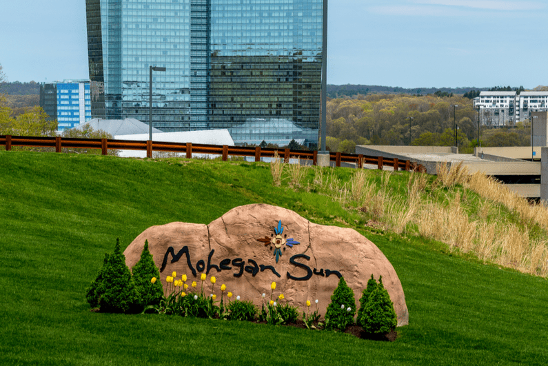 Mohegan Sun logo on a rock outside the casino